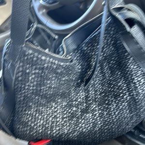 Black all leather woven bag